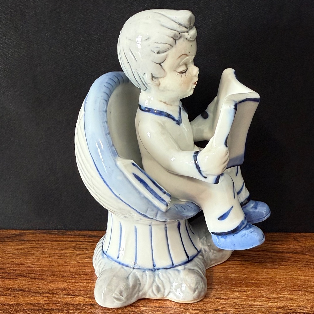 Little Boy Reading Book on Chair with Bear Rug Figurine - Picture 6 of 13